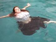 Huge Babe Goes Swimming Fully Clothed