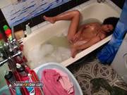 Hot Babe Is Masturbating In The Bath Tub While Her Neighbor Is Secretly Watching Her Through A Hole