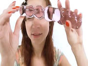 Hungarian Girl Using Huge Glass Toy