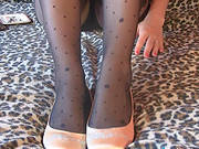 Cutie In Pantyhose Takes Deep Drags On Her Cigarette