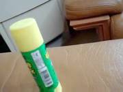 Bored Oriental Small Cookie Play With Glue Sticks