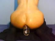 Angie Riding A Bottle