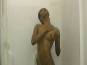 Ebony Woman Showers For The Videocamera