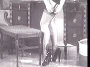 Betty Page In Stockings And Suspenders