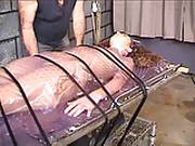Horny Brunette Takes Pain Wrapped In Plastic