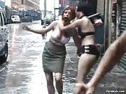 Sexy Brunette Chick Gets Whipped On The Street By Two Sluts