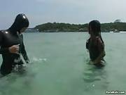 Nasty Chicks In Latex Have Fun In The Sea