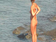 Watch Nude Babes Enjoying The Beach