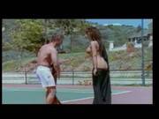 Man And Woman In Tennis Court