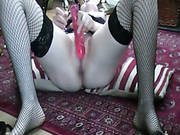 Horny Girl In Black Stockings Masturbates With A Red Dildo