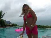 Tanned Blonde In Pink Bikini Gets Naughty In The Pool