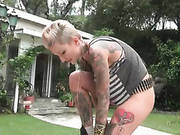 Heavily Tattooed Girl Rides In The Car