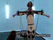 Strapped Wired Redhead Femdom Electro Shocked