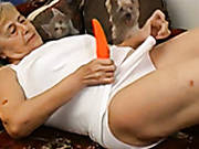 Filthy Granny Is Playing With Her Loose Pussy Using Smooth Sex Toy