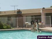 Goth Lesbians Kissing Outdoors By The Pool