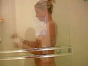 Amateur Blonde Masturbates Shaved Pussy In The Shower
