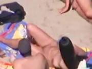 Two Guys Cums On Nude Girl At The Beach