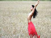 Passionate Black Haired Doll Mira Is Walking Topless In The Field And Suddenly Rips The Skirt Off