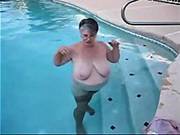 Corpulent Granny In Nylons Plays In The Pool