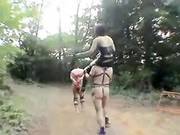 Plays With Slaves Outdoors