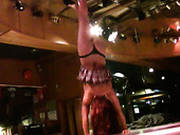 Sexy Brunette Pole Dancer Takes Off Her Clothes On The Stage