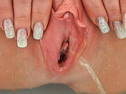 Filthy Pissing Action And Pussy Stertching Action Performed By Dirty Skank Joanne