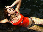 Filthy Teen Slut Is Bathing In The Ocean Fully Clothed