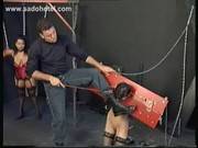 Two Scared Slaves Tied With Their Arms An 