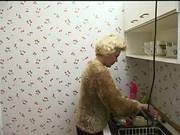 Older Woman Gives Young Man Bath
2000