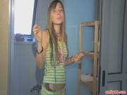 Teenage Girl In Her Bathroom