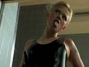 Blonde Teases By Showing Off Latex Clad Figure