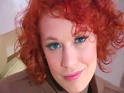Alluring Redhead Posing Like A Slut