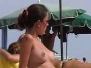 Brunette With Tits Tanning On The Beach Been Voyeured