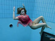 Pretty Red Dress On Girl Swimming In The Pool
