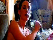 Horny Gal Smokes And Masturbates