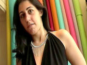 Busty Slut Poses While Piercing Her Tits