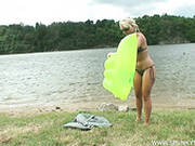 Dirty Blond Milf Gives Blowjob To Horny Dude At The Beach